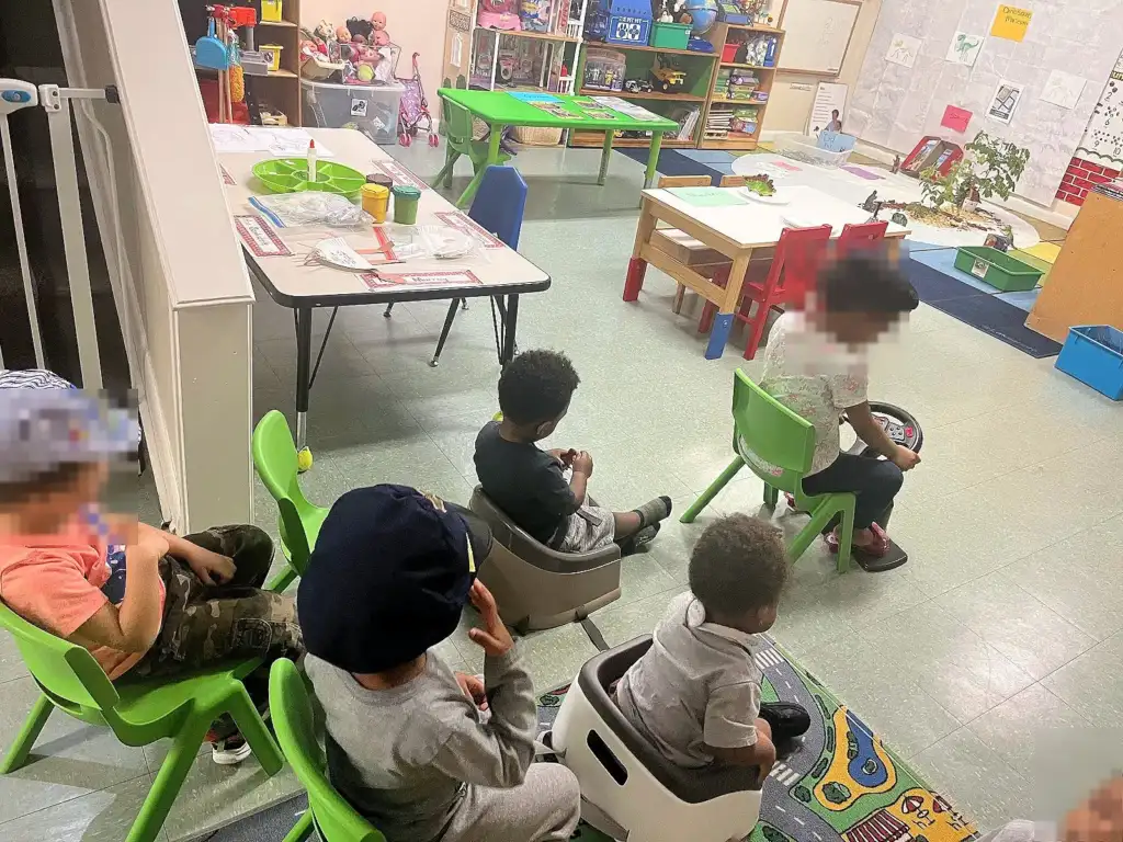 Children seated together in the Bright Starts classroom